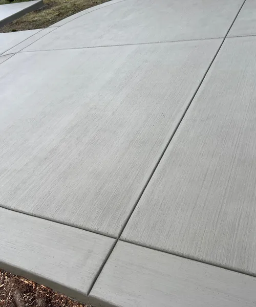 Broom Finish Patio Replacement With Decorative Border And Swimming SPA Slab in Kent 